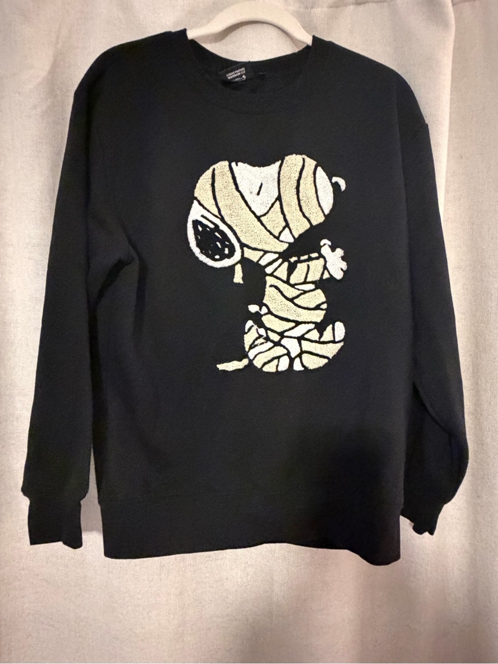 Peanuts Black Crewneck Sweater with Cream Graphic Snoopy